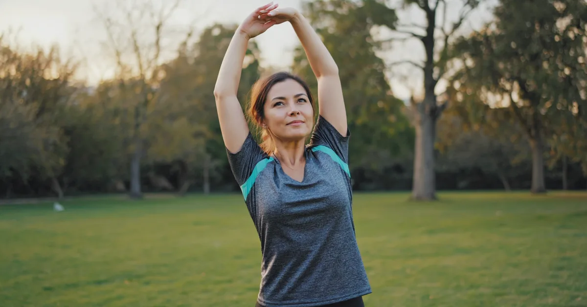Irish woman enjoying active lifestyle park β Slimbr weight-loss support