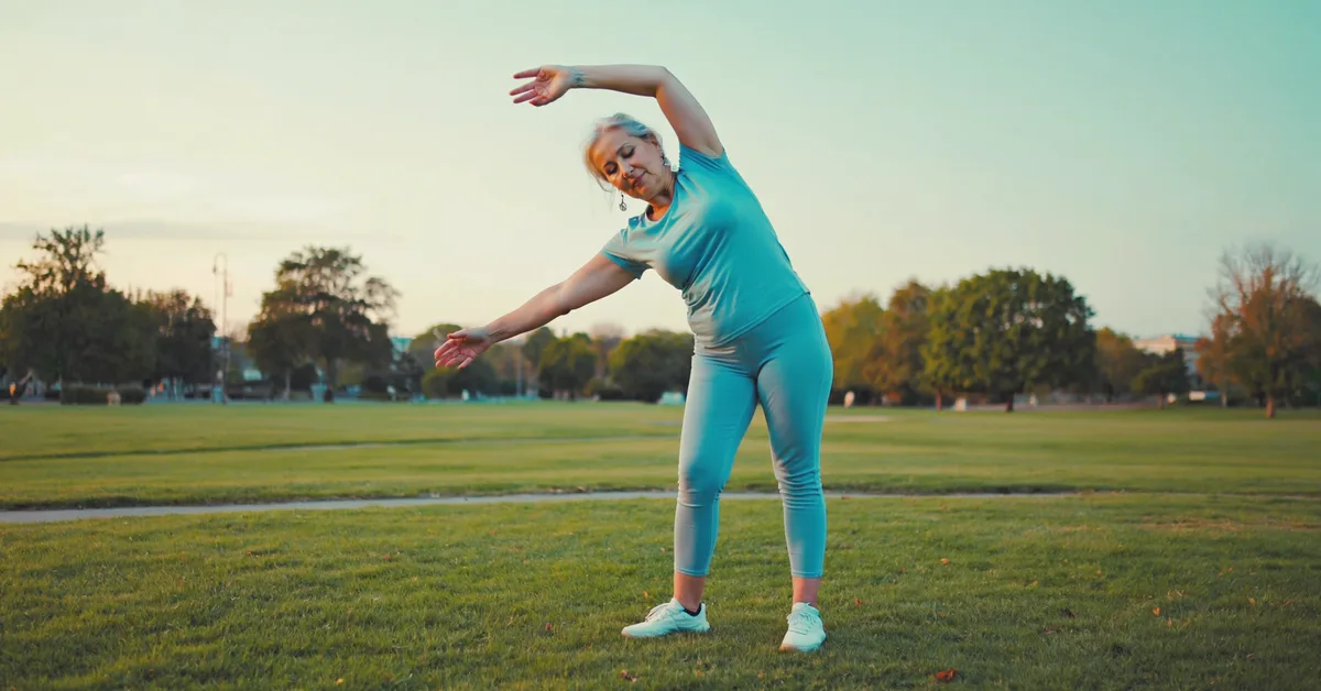 Irish woman enjoying active lifestyle park β Slimbr weight-loss support