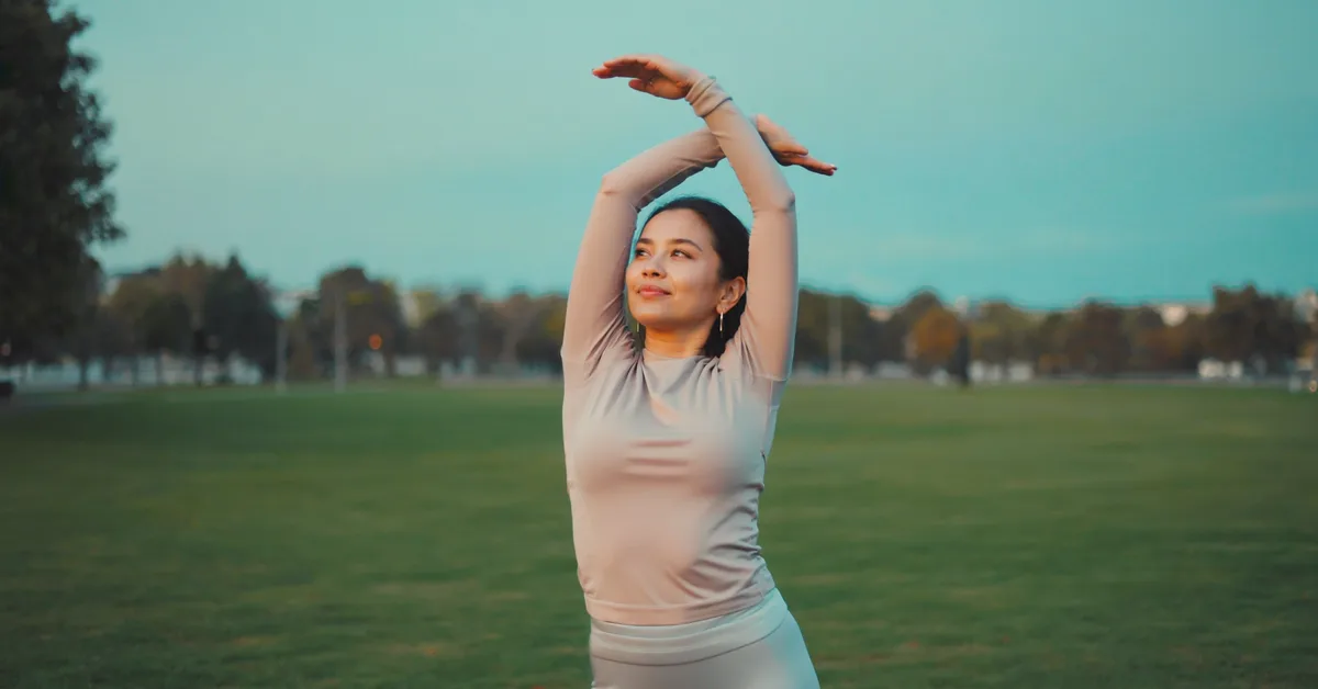 Irish woman enjoying active lifestyle park β Slimbr weight-loss support