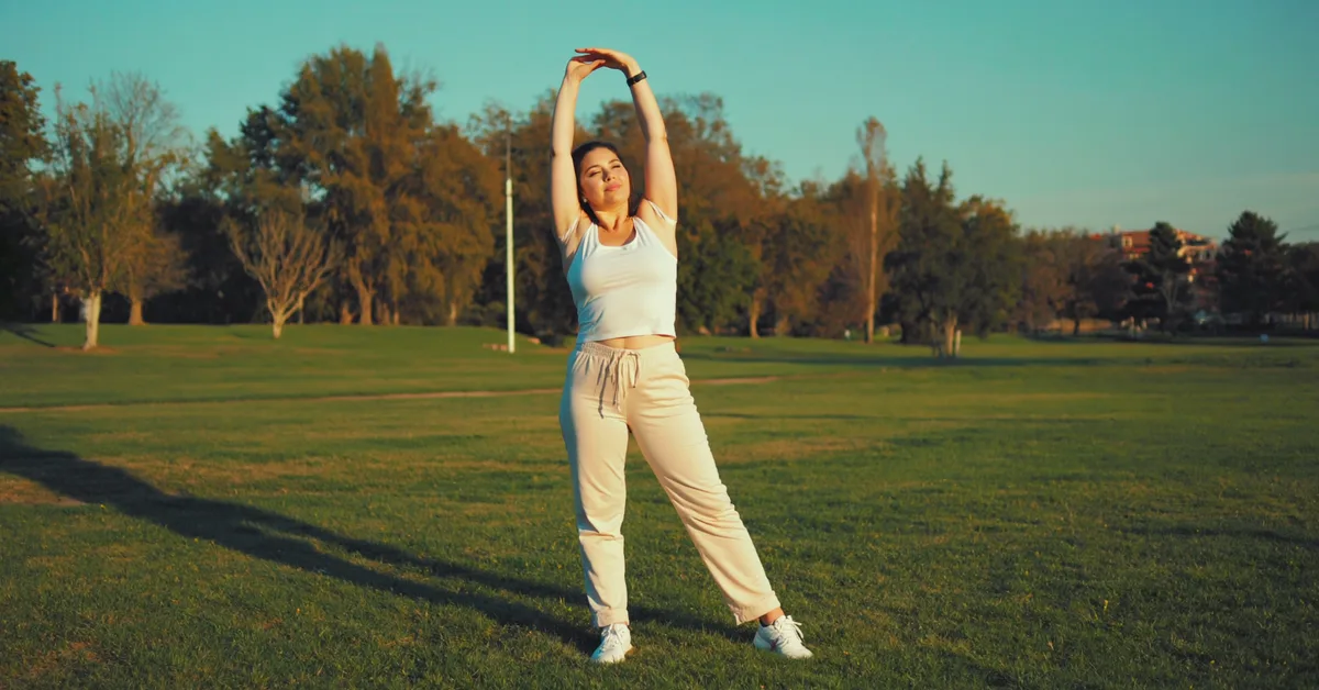 Irish woman enjoying active lifestyle park β Slimbr weight-loss support